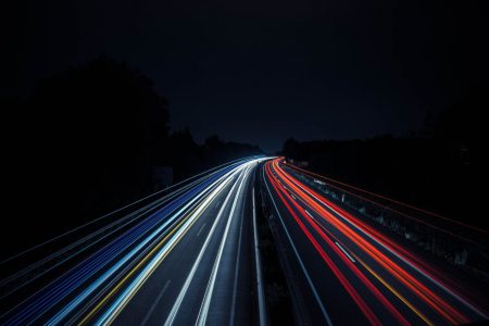 time lapse photography of vehicles on highway