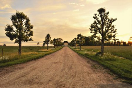 clouds country countryside dirt road