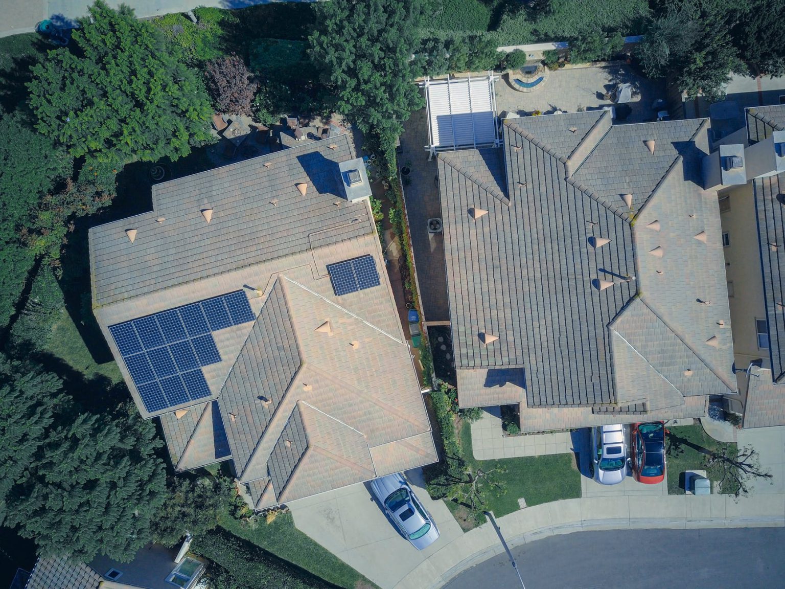 aerial view of two houses with roof tiles