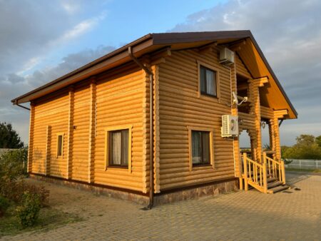 rustic wooden log cabin in daylight